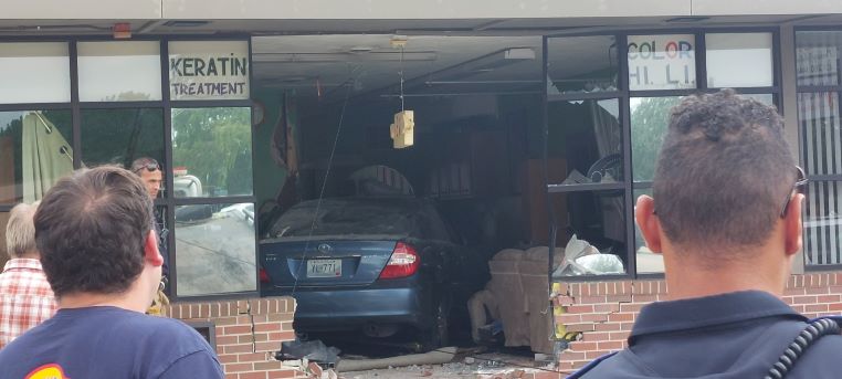  Woman crashes car into Cranston building