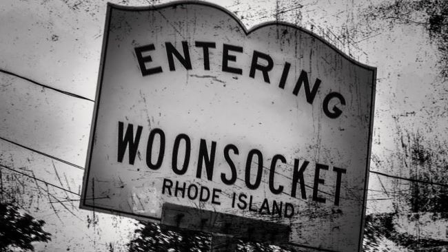 https://lprnews.org/wp-content/uploads/2023/10/woonsocket-sign.jpg