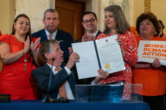  Governor McKee Signs National Gun Violence Awareness Day Proclamation