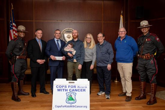  2024 RISP Boston Marathon Team Presents $5,500 to Local Family Battling Childhood Cance